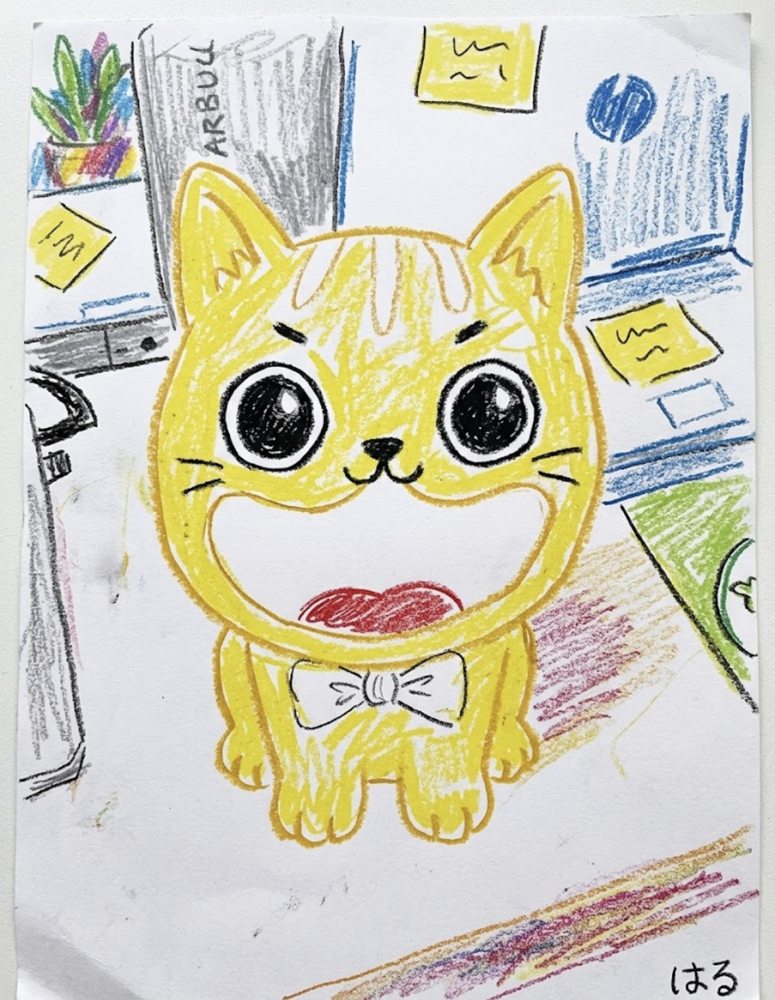 お子さまが描いた黄色いネコの絵